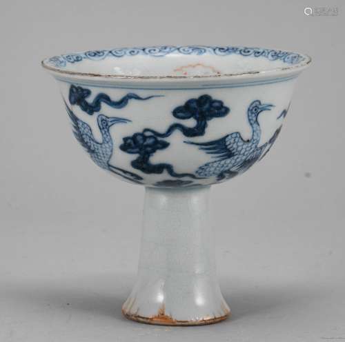 Blue and white high legged cup
