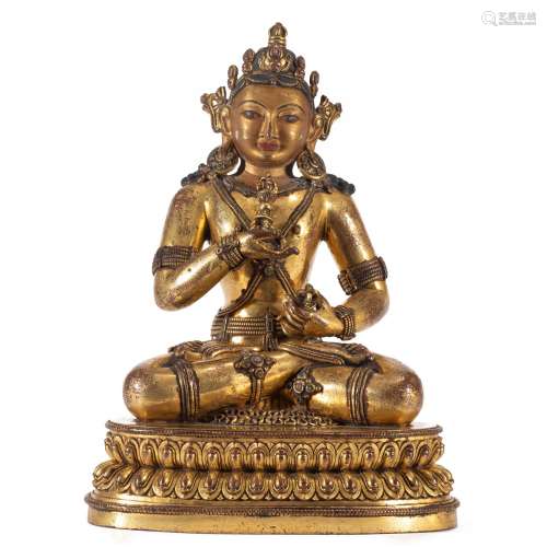 A GILT BRONZE FIGURE OF BUDDHA STATUE