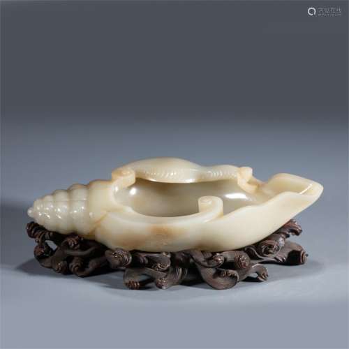 A CARVED JADE CONCH SHAPED BRUSH WASHER