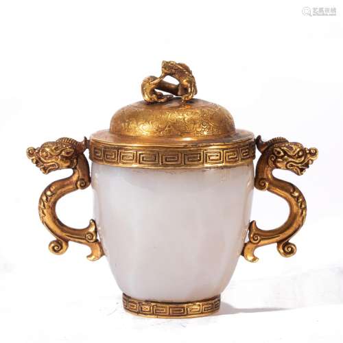 A GILDING MOUNTED GATE CUP AND COVER