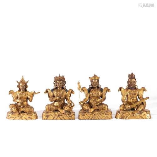 A GROUP OF GILT BRONZE FIGURES OF THE FOUR GUARDIANS