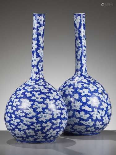 A PAIR OF BLUE AND WHITE ‘ICE CRACK AND PRUNUS’ BOTTLE VASES...