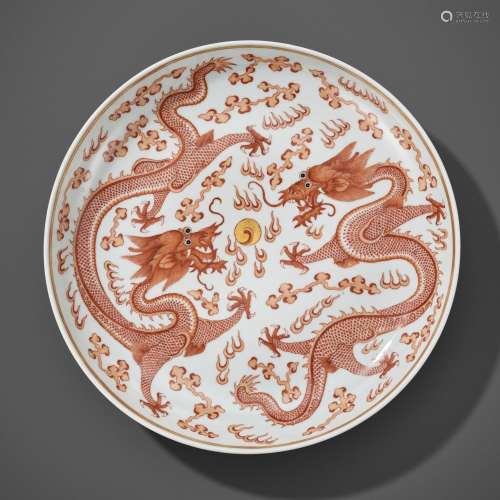 A LARGE IRON-RED AND GILT ‘DRAGONS’ DISH, GUANGXU MARK AND P...
