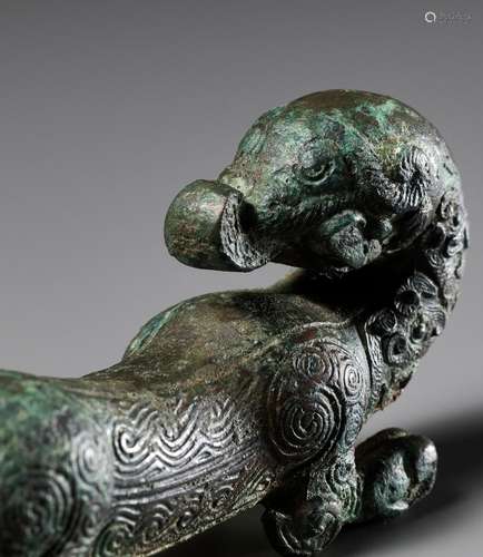 A SUPERB BRONZE FIGURE OF A DRAGON, EASTERN ZHOU DYNASTY, CH...