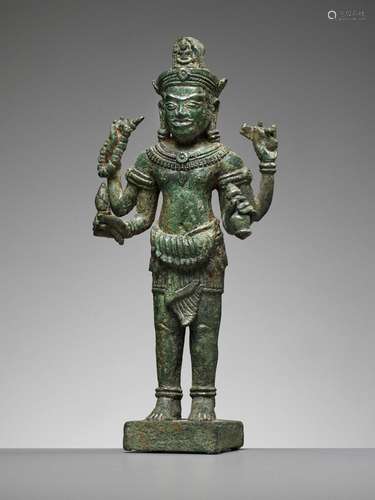 A KHMER BRONZE FIGURE OF AVALOKITESHVARA, ANGKOR PERIOD