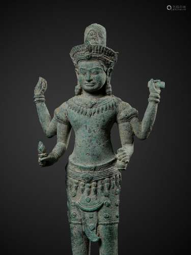 A LARGE BRONZE FIGURE OF AVALOKITESHVARA, ANGKOR PERIOD, BAY...