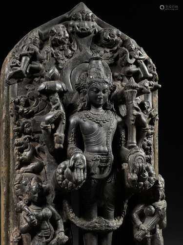 A MASSIVE BLACK STONE TRINITY STELE DEPICTING VISHNU, SARASV...