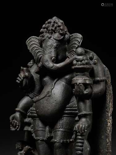 A GRANITE FIGURE OF GANESHA, ORISSA, 13TH CENTURY