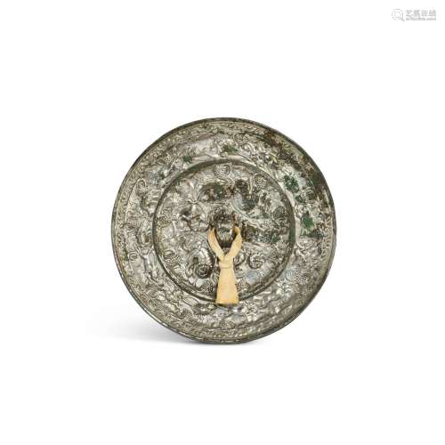 <br />
A bronze 'sea beasts and grapes' mirror, Tang dynasty...