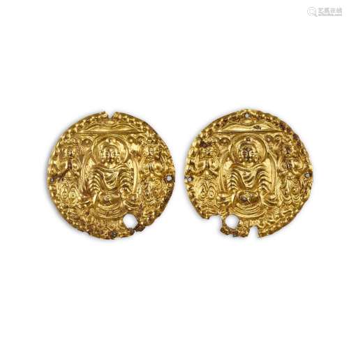 <br />
Two gilt copper alloy repoussé 'buddha and attendants...