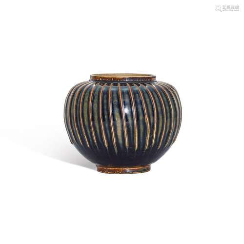 <br />
A Cizhou black-glazed ribbed jar, Northern Song dynas...