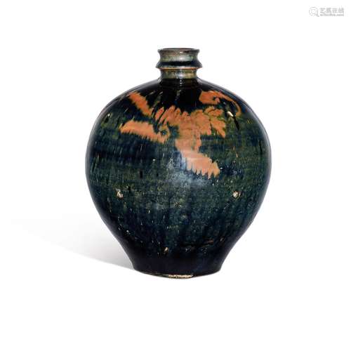 <br />
A black-glazed russet-splashed jar, Jin dynasty 金 黑...