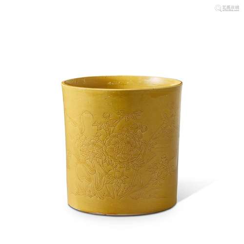 <br />
A unique incised yellow-glazed 'peony and chrysanthem...