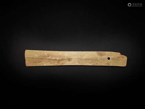 <br />
A calcified jade ceremonial blade, Shang dynasty or l...