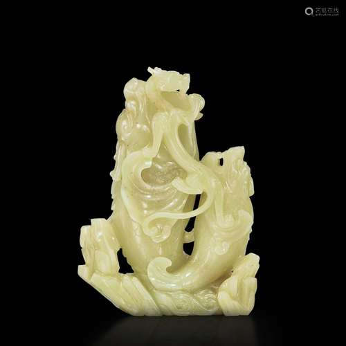 <br />
A yellow jade 'carp and dragon' double vase, Qing dyn...