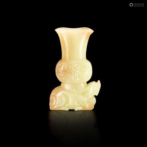 <br />
A small yellow and russet jade archaistic 'mythical b...