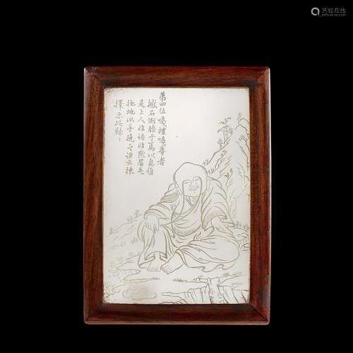 <br />
An inscribed white jade 'luohan' plaque, Qing dynasty...