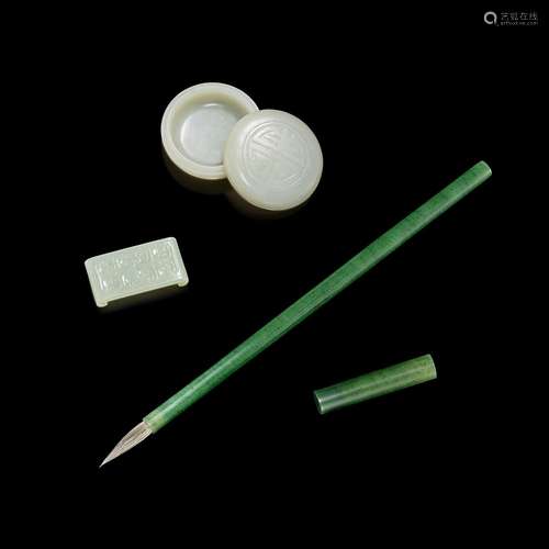 <br />
A group of three jade scholar's objects. Qing dynasty...