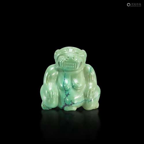 <br />
A turquoise seated mythical beast, Han dynasty or lat...