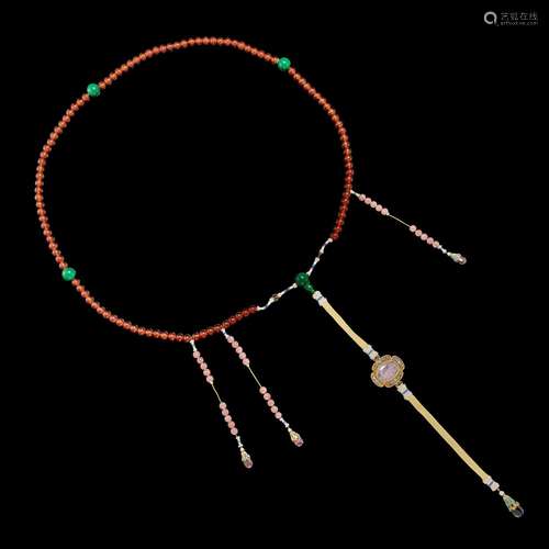 <br />
An amber and jadeite court necklace, chaozhu, Qing dy...