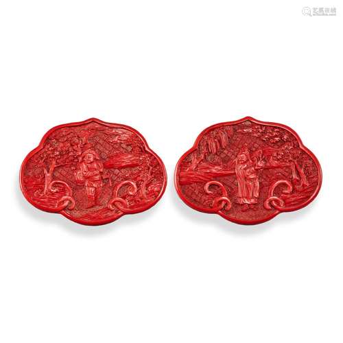 <br />
A pair of cinnabar lacquer carved 'tribute bearer' bo...