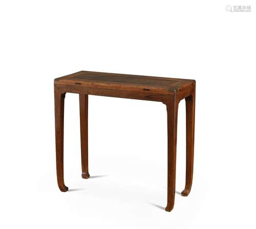 <br />
A huanghuali corner-leg side table, Late Ming - early...