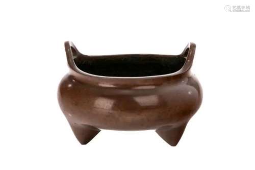 A CHINESE TRIPOD BRONZE CENSER