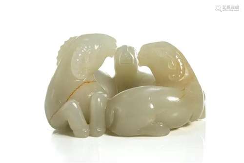 A CHINESE WHITE JADE CARVED "THREE RAMS"