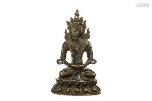 A TIBETAN BRONZE & GILT BUDDHA