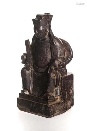 A CHINESE MING WOOD CARVED OFFICIAL STATUE