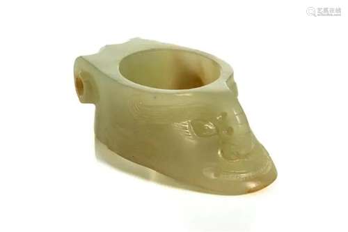 A CHINESE JADE CARVED MYTHICAL BEAST THUMB RING