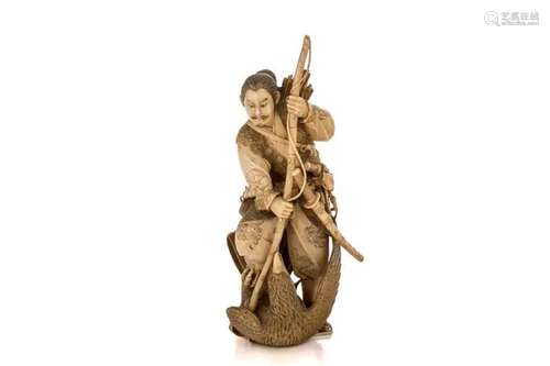 A JAPANESE NATURAL CARVED FIGURINE OF A WARRIOR