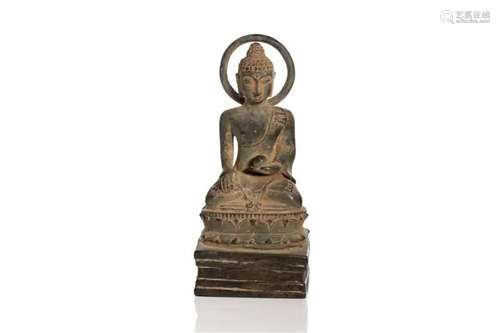 A 15TH C. INDONESIAN BRONZE MEDICINE BUDDHA