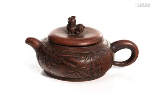 A CHINESE YIXING TEAPOT W/ PLUM & BAMBOO DECO