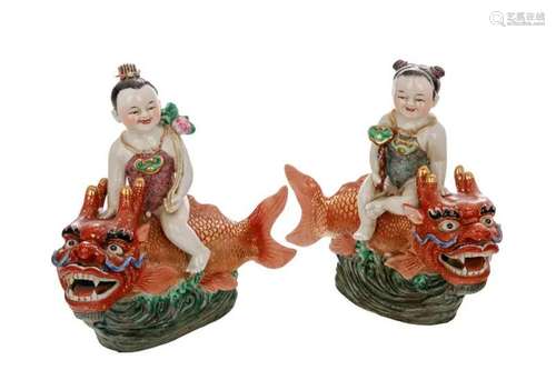 PAIR OF CHINESE FAMILLE ROSE PORCELAIN CHILDREN