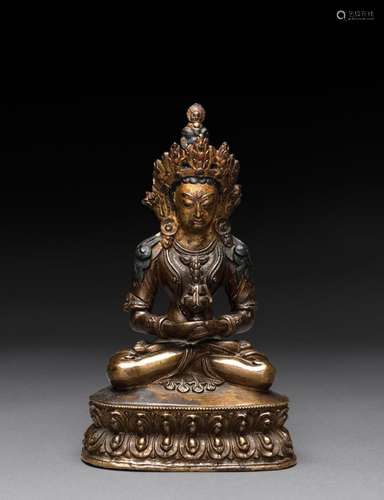 A SINO-TIBETAN GILT-BRONZE SEATED FIGURE OF AMITAYUS, QING D...