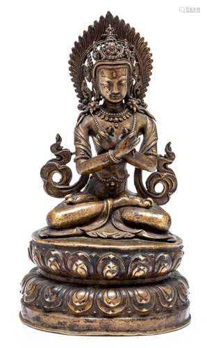 A TIBETAN SEATED BRONZE VAJRADHARA, 15TH CENTURY 18cm high