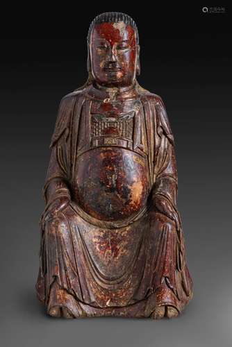 A RARE AND LARGE CHINESE CARVED AND GOLD LACQUERED WOOD FIGU...