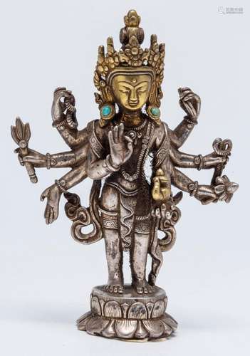 A RARE BHUTAN PARCEL-GILT SILVER ALLOY AND GILT FIGURE OF AV...