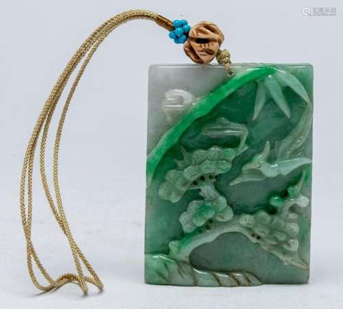 A CHINESE JADEITE PENDANT, LATE QING DYNASTY, EARLY 20TH CEN...