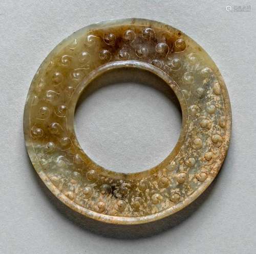 A CHINESE ARCHAIC JADE RING YUAN, WARRING STATE PERIOD (476-...