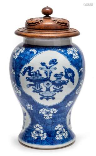 A CHINESE BLUE AND WHITE JAR AND WOOD COVER, KANGXI PERIOD (...