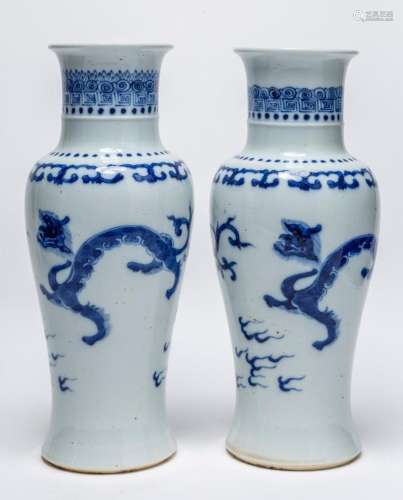 A PAIR OF CHINESE BLUE AND WHITE DRAGON VASES, QING DYNASTY,...