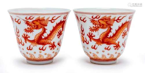 A PAIR OF CHINESE IRON RED DRAGON CUPS, GUANGXU SIX-CHARACTE...