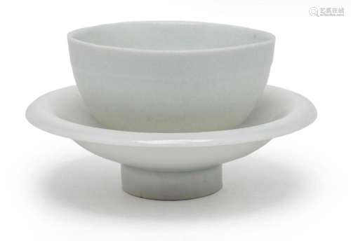 A CHINESE QINGBAI CUP AND SAUCER, SONG DYNASTY (960-1279) cu...