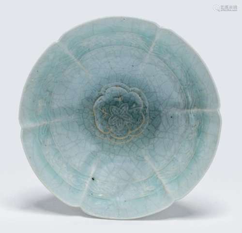 A CHINESE QINGBAI MOUDED FOLIATE-RIMMED TEA BOWL, SONG DYNAS...