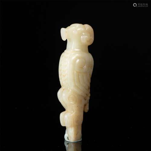 A CHINESE CARVED JADE BIRD