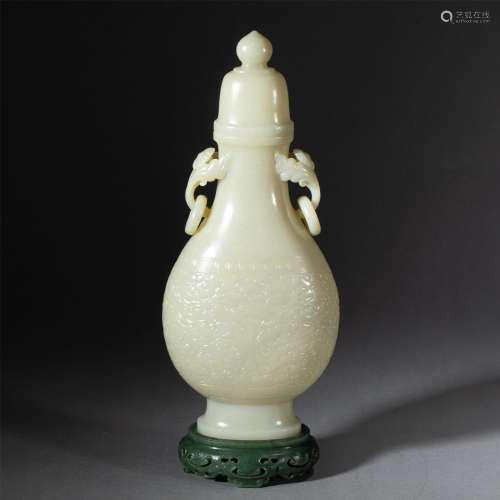 A CHINESE CARVED JADE VASE AND COVER