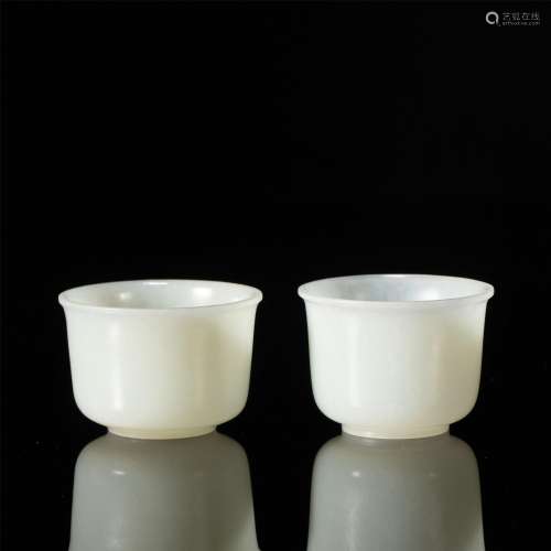 A PAIR OF CHINESE CARVED JADE CUPS