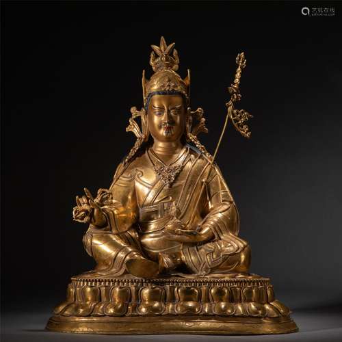 A CHINESE GILT BRONZE FIGURE OF PADMASAMBHAVA